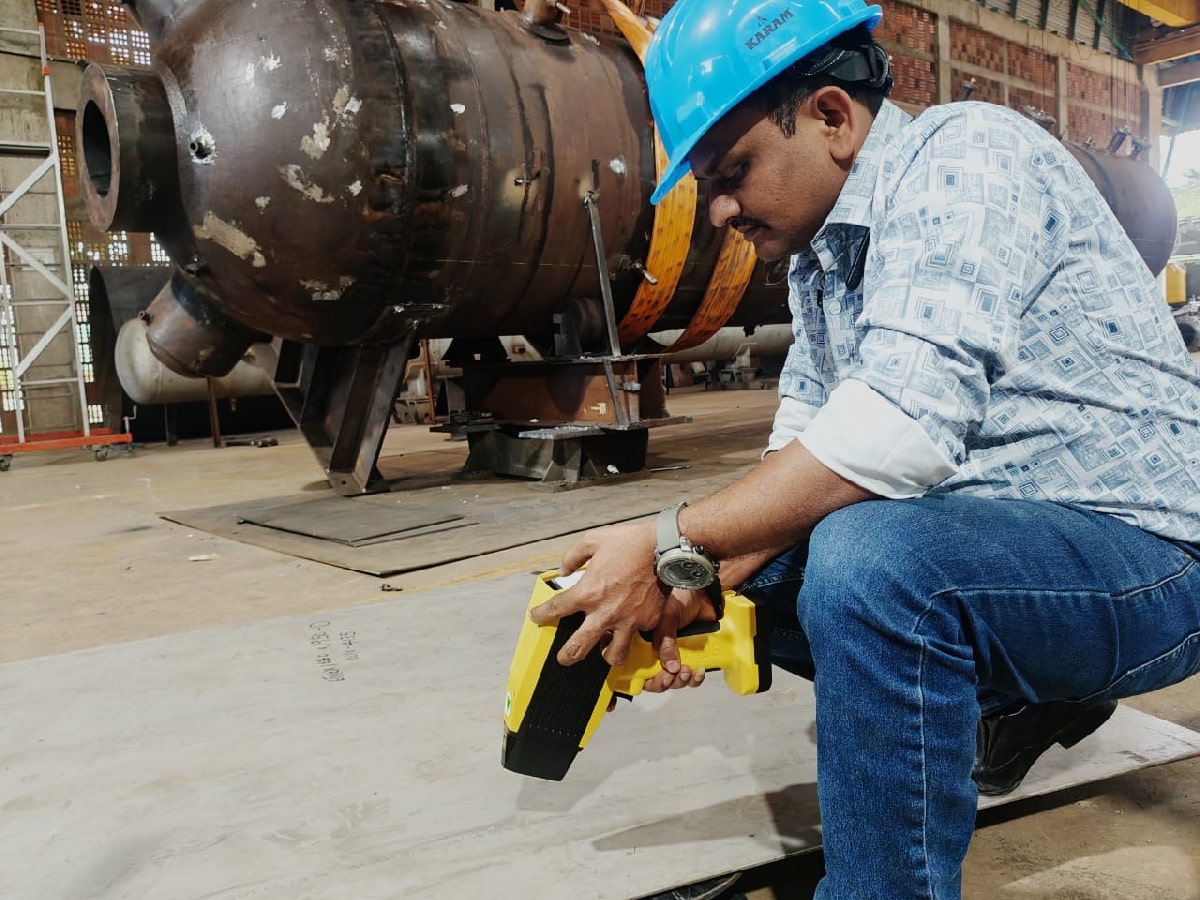 Positive material identification PMI testing service using XRF analyzer in Bangalore