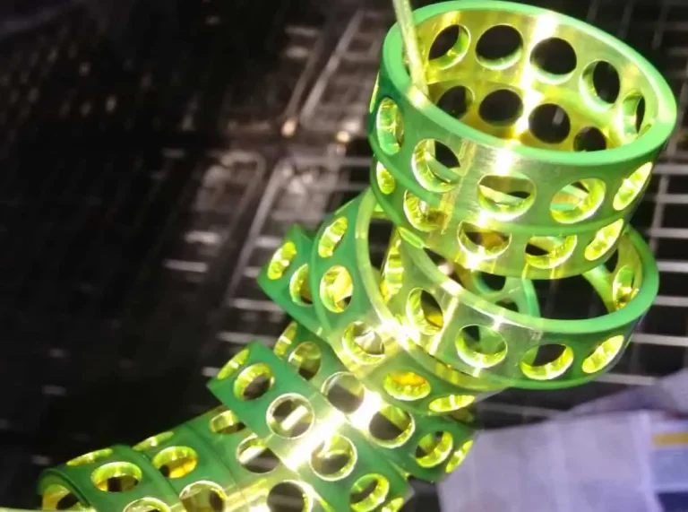 Fluorescent penetrant testing laboratory with black light inspection booth