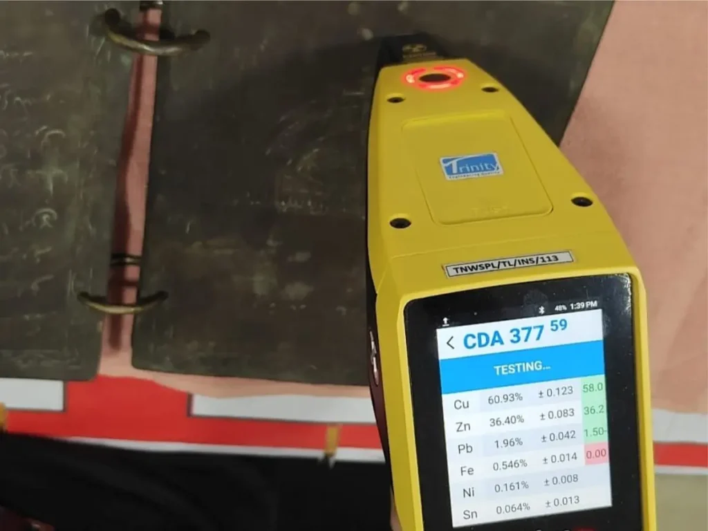 PMI XRF metal composition testing performed on metallic Quran at Trinity NDT lab Bangalore